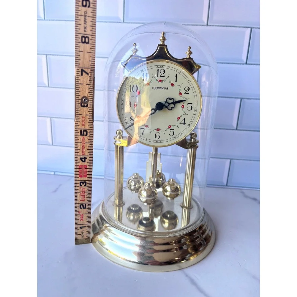 Chronos Quartz Anniversary Clock Gold Tone Glass Dome Floral Face Rotating Ball
